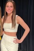 Adorable two piece set.  Small amount of stretch.  White fabric provides good coverage. - Kristen G.