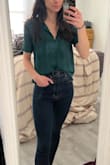 Really love the style and cut of this shirt. It's a tad big, but it's not too oversized to look like I'm swimming in it. It's shorter than I thought it would be, so tucking it into pants would be difficult unless wearing something super high-waisted. The material is thin but not cheap, and I feel like I could dress this up for work or wear it casually. The color is also absolutely gorgeous. - Stephanie S.