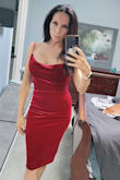 This dress is a perfect fit. I have a larger top and a smaller body and this forms to my body perfectly. It's very comfortable. - Heather D.