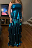 I ordered 3 dresses to try on for my brother's wedding and even though I decided not to keep this one I still love it! Fits perfectly on me other than it being too long but I'm short so I just assumed I would've had to get it altered. Dress is really good quality too! Ended up not choosing this one because it was just a little too flashy for my brother's wedding and I just liked one of the other dresses better but if I was able to, I would definitely just keep it and wear it elsewhere! - Alli B.