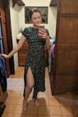 I went back and forth on this one for a while, ended up buying it and I am SO glad I did. It's truly the perfect dress. Super lightweight, comfortable, and so flattering. It was surprisingly slimming, too. The open back and slit give this dress some character and the high neck is gorgeous. Definitely my #1 dress now! - Kim L.