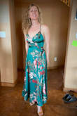 I bought this dress for a beach wedding in Hawaii and it did not disappoint!  The color is gorgeous, the feel is amazing, and the cut is perfect!  I won't even have to wear a bra with it.  It just hugs in all the right places.  I had to get it hemmed (like 5 inches cut off the bottom), and I had the front sewed up a little bit because it was a little low for me.  But just absolutely beautiful!  To put this in perspective, I am pushing 50 and this dress made me look amazing! - Claire A.