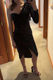 This dress was perfect. It fits true to size and I received so many compliments. I also had no issue with irritation under my open arm from the sequins (which I had read about in a couple of reviews). If you're considering buying this DON'T WAIT! - Chantel C.