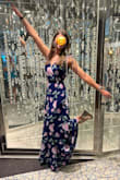 Gorgeous dress, I love the open back and it was perfect for a cruise! It is very long though. I'm 5'7 and had to wear wedges to prevent it from dragging on the floor and even with the extra height was still stepping on it throughout the night. - Amy D.