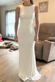 Great quality, thick, and stretchy dress! Really showcases your curves and the back is stunning. I wanted something different in the front so I went with another dress but I love the back so much this was my second pick. - Delanie S.