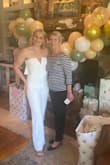 Loved everything about this jumpsuit. It looked beautiful on and I got tons of compliments during my bridal shower. It fit true to size and stayed in place pretty well. The hanging straps were the only thing that bothered me, but I didn't want to remove them due to not being able to hang after. - Haleigh P.