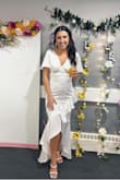 The dress fit perfectly! It was a tiny bit baggy in the boob area but it wasn't a big deal at all and could barely tell... I just had to stand up straight and wear a padded bra. I got so many compliments on this dress. I love it so much. - Carlee L.