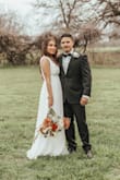 I loved my whole experience. It was shipped in good condition. The box, the bag, and the dress were all handled with care. I loved the black bag provided to hang the dress and zip it up in. The material was so soft and high-quality. This ended up being my wedding dress and I felt beautiful in it - Celeste V.