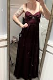 Love this dress. Exactly as pictured. The material is a tad heavy, but that's likely because it is high-quality material. The slit is the perfect height and the chest area of this dress is incredible. I'm short so I have to wear pretty high wedges, but could probably easily be altered and the straps are adjustable so that helps too! - Devyn S.