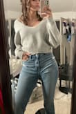 It's cute to wear out. Doesn't stay on my shoulders but makes it a nice look. I felt it was a bit large on me but I'm very skinny so it may be true to size. Looks like good quality. - Maria G.