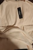 I did not receive the dress. Instead, I received a pink sweater that I am trying to return. - Lakeisha S.