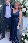 I wore this dress to a black tie optional wedding. It fit perfect and I received so many compliments on it! The only flaw is the zipper it kept getting stuck (on the fabric) where the fabric changes in the bust and it took me a while to zip by myself. 

Was able to wear it without a bra and had great coverage. Im 53 and only needed 1 1/2 in heels for it to be the perfect length. - Mercade S.