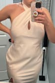 I don't know what happened. I was really excited to get this dress for my bridal shower but it fit SO WEIRD. Not only was the neck wrap part too tight, it doesn't seem DD+ size friendly. Maybe because of my chest, it hit my hips so weird. It was tight around my thighs but the dress did this terrible jutting-out thing on my sides. I had like two shark fins above my hips. - Sierra R.