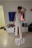 This dress is beautiful, the tail is super cute, good material, and quality and it comes super nicely packed, it comes with its bag to store the dress. The color is beautiful. I am a very happy good choice - Diana B.