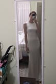 I love the look of this dress and I think the back is really elegant. I ordered a small and it is tight but flattering. The only tricky downside is you'll need very seamless solutions for underwear and a sticky bra or petals so as not to show lines. - Jazlyn D.