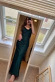 I was on the fence but I ended up buying it and I'm so glad I did - gorgeous dress. Definitely not something I'd want to jump around in *too* much because it is very dainty and delicate, especially at the straps, but there were no mishaps on the dance floor and I felt very comfortable. It fits like a glove, so definitely size up if you want extra breathing room. The fabric really shouldn't be ironed at all, even on low heat it seemed to cause sight darkening on a test area. To get the wrinkles out when you don't have a steamer, throwing it in the dryer in a protective mesh bag and on a delicate setting worked great. - Sayge M.