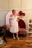 The fit and look of it were overall great! It was a very beautiful dress and got tons of compliments on it at my bridal shower. BUT two things that are a need to know! 1. The arm part is tight, I don't have small arms, but I don't have a lot of extra fat on them as well. They were comfortable enough to wear but a little lower would have been ideal. Also the range of motion because of the arm part makes it hard to fully lift/move your arms. *Note, I do have broad shoulders. 2. The zipper is so cheap quality. Less than 30 min before my event started my zipper broke when trying to zip it. It's not because it was too small because it was the perfect size and I had a little overlap. Thankfully my good friend carries a sewing kit with her and literally sewed me into the dress!
I attached two photos, one of the front and one of the back after it was temporarily fixed - Lynae H.