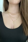 I've been trying to find a simple layered necklace for a while, and this was perfect. I like that they aren't connected so I don't have to wear all 3 at once or can combine them with other necklaces I already own if I want. - Atena B.