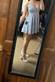 It's not the color it shows in pictures but it is very flattering! Big on the top but very short. - Sophia R.