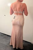 The dress was just ok. The top looks kind of weird but the rest looks good. I normally wear M but I went L, which helped to fit in the body (but a bit loose in the bust) and long enough to just hit the top of my feet. It is a beautiful dress but not for this body - Maria D.