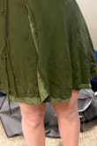 It looked fine when I tried it on, but after I washed it just the top layer shrank and now you see a good amount of the lining all the way around and it looks bad. - Stephanie S.