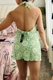 This set is very pretty but unfortunately, the top and skirt were not a good fit on me. The top would show my entire chest if I barely leaned forward. Not sure double sided tape would work with nowhere to hide it. Sadly I'll be returning it. The one plus side is it made my back look great lol. - Joanna F.