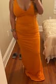 This was my first time ordering from Lulus and I'm so happy with my purchase! It's made well, comfortable, stretchy, and flattering. I'm very short so it'll be hemmed, as expected. I was shocked that my chest feels supported without a bra but will have the straps taken up an inch. Shipping only took 4 days! - Tristen P.