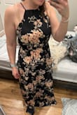 The dress fit a little big, but still worked. It was so flattering on, but I really wanted navy and pink& which it is not. It was more black looking, and the flowers were predominantly tan, not pink. Even though it wasn't what I was expecting colours wise, I would have kept it anyways, but I felt like the quality and the price tag did not match. - Hannah A.