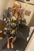I wore this to a winter wedding and it was very comfortable, flattering, and most importantly, not too short! I always struggle with dresses being way too short and this one is the perfect length. At first, I ordered a medium but the front was way too revealing. I exchanged for a large and that fit just right. I still put a safety pin in the front to keep it closed but I do this with pretty much every dress I own. I also put a safety pin at the bottom so I could dance and not worry about revealing my spanx. Definitely recommend this dress! Got a lot of compliments too! - Jacqueline L.