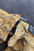 I had been eyeing this dress for a while, but when I got the dress in it was both small and had tears on the stitching waist of the dress! - Heather J.