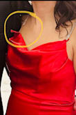 The strap broke off during my friend's wedding. Don't buy this one. Also, the top area is for someone with a large bra size even though I got a small and then the stomach area is a bit tight. Not a great fit - NASSRIN B.