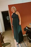 I bought this dress to wear it to a wedding. It fits true to size (I bought extra large size) though I had to have it hemmed. The fabric and flowing design fit nicely and I did not need to wear a girdle. It's very elegant, I got so many compliments! I wore it with silver platform 12-inch sandals and brought an off white cover up with me just in case it was chilly.  It was a late summer wedding but the color is perfect to wear any season. So happy with my purchase! - Patricia C.
