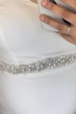 I loved the belt itself, it was very detailed and felt so beautiful on. The only issue was that my dress has some detailing and the tulle-like material that is used on the belt to tie it in the back looked awkward. Perfect for a dress with no back detailing - Azalie G.