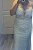 This dress is very beautiful, but it was too revealing for me and sadly it was really difficult to put on myself. Little small on the hips btw. - Azalie G.