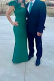 Wore this to a black tie optional wedding.  Ordered XS first and it zippered but felt that the waistband was pulling a bit.  Small fit perfect.  Lots of compliments and could wear a regular bra which is always a bonus. I'm a size 0/2 for reference with an athletic build. - Lora S.