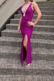Gorgeous color.  You can not wear a bra but used tape so the dress would stay put.  Lots of compliments.  I wore it for a black tie optional wedding.  I'm a 00 for reference with an athletic build. - Lora S.