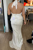 I wanted to love this dress, and maybe on someone else's figure it would look better, but since I have a small bust, there were gaps between my armpits since my bust didn't fill it out. Also, I felt like the slit was just a bit too wide for me. But I LOVED the material - it was so comfortable and elegant! - Tara N.