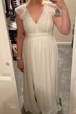 I was going to wear this for my vow renewal but ended up finding something else. It was gorgeous though! - Christina R.