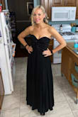 This dress was perfection. I'm usually between a Small/Medium & I went with the medium based on other reviews saying it was on the smaller side. So glad I did as the Small would have been way too tight. This is a staple long black dress for any formal event. Highly recommend!!! - Melisa M.