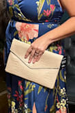 You can dress this bag up and down. I bought it for a wedding but I use it even when I'm in jeans and booties. It is so cute and plenty of room inside. - Kimberly N.