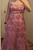 The pink color is even better in person and it's perfect for a summer wedding. My only complaint is that the top runs a little big with the size of my chest, I wish you could pick different sizes for the top and bottom. - Kalla S.