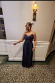 I wore this dress to a wedding and received many compliments. Unfortunately, right after the ceremony, the zipper broke and the only way to get free was to tear the zipper track. We had to use double-sided tape to seal the gap. Disappointing because the dress was flattering. - Cynthia B.