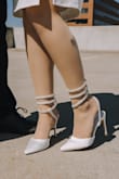 I hosted a styled shoot and had my model wear these shoes. They were absolutely stunning but the only issue my model had is that they don't have a back to them so they were a little hard to walk in. - Rachelle P.