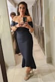 I bought this dress for my nieces birthday party.  I got so many compliments.  The dress fit like a glove.  The material is like spandex. Good quality.  I didn't need to hem it at all.  Will be wearing this dress again to a wedding. - JEANNETTE M.