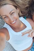 I love this tank so much I bought 2 in white just in case and the orange. It's great over a bikini or you can dress it up. - Jenn N.