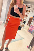 I love this skirt but prefer to wear it with a black crop top. It's super sexy and the material is stretchy and smooth in the right places. - Jenn N.