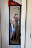 It's sooo pretty! Works great for a larger bust size and keeps it modest. The slit on the leg comes up a little over mid-thigh, but I like it that way. It shines and sparkles in the light, and only sheds a little of the sparkles. 
My only issue is that it's very long. Even with 4-inch heels, it's still dragging on the floor for me. If I had time I would get it hemmed up. 
I still think it's worth it though! I feel comfortable and pretty! - Violet P.