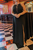 I'm 5'2" so even with 2.25" heels it was dragging a lot. I had alterations which cost as much as dress just to hem but it was worth it because just that change felt great and got tons of compliments. It's a flattering cut and I recommend it!!! - Aya Z.