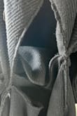 I put it on to wear it for my anniversary and by the time I got to the elevator I felt a breeze on my stomach and it came apart from the seam 20 steps from walking in it. Now I have to pay $7 to ship back a defect. Very disappointing - CJ M.