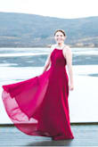 I originally ordered this dress in a small to wear for my elopement in Iceland and had to send it back for a medium. Loved the material and how soft it is. I took it to get hemmed as it was incredibly long. Also a little disappointed with the lining in the bust area. I wish there was more padding as there's not much, to begin with. If you get cold, people will be able to tell. Otherwise, the fit is wonderful and I read in other reviews that the potential for side boob was a real issue but the adjustable straps make it a worry-free wear! - Christine G.